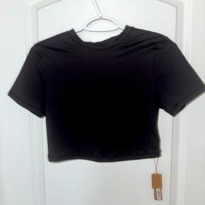 Skims recycles swim Tshirt. Size Lg NWT